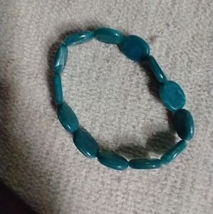 Greenish blue beaded stretch bracelet